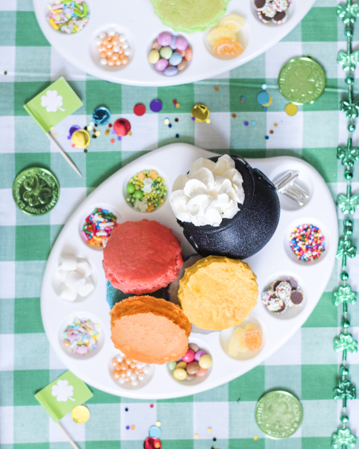 Decorate your own pancakes party - rainbow sprinkles on an artist's palette, shamrock flags and Leprechaun green golden coins