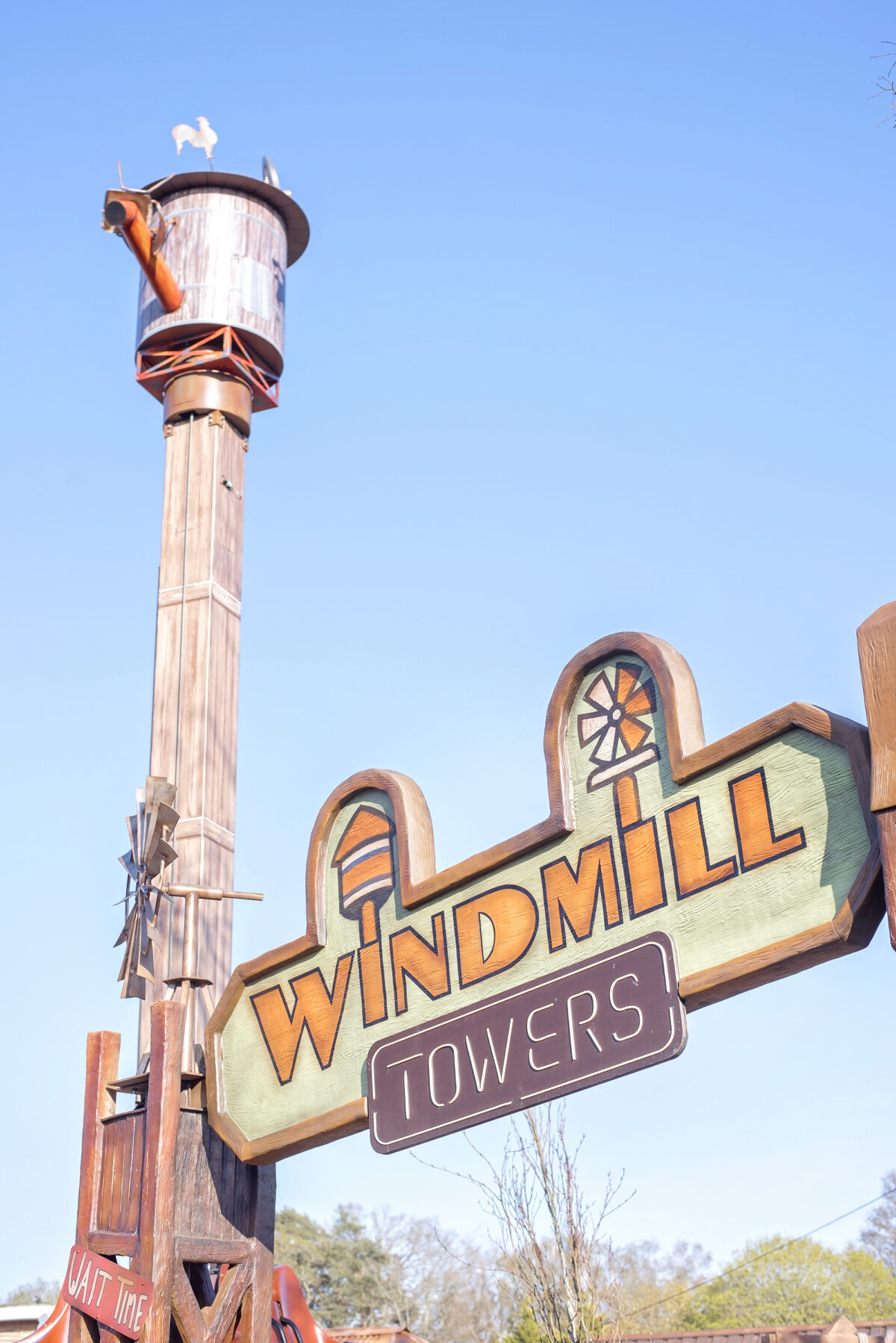 Image shows the signage for the Windmill Falls ride at Tornado Springs, Paultons Park, Hampshire.