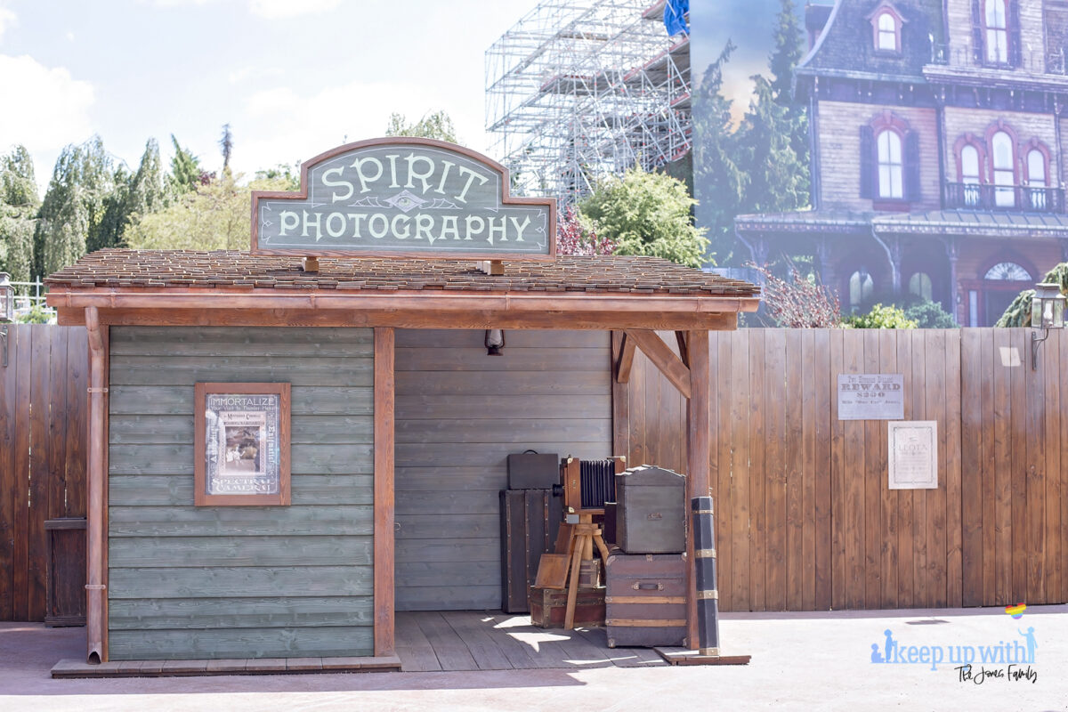 Image shows the Disneyland Paris Spirit Photography Booth where you can print a personalised copy of the Mysterious Chronicle by Phantom Manor. Image by Keep Up With The Jones Family.